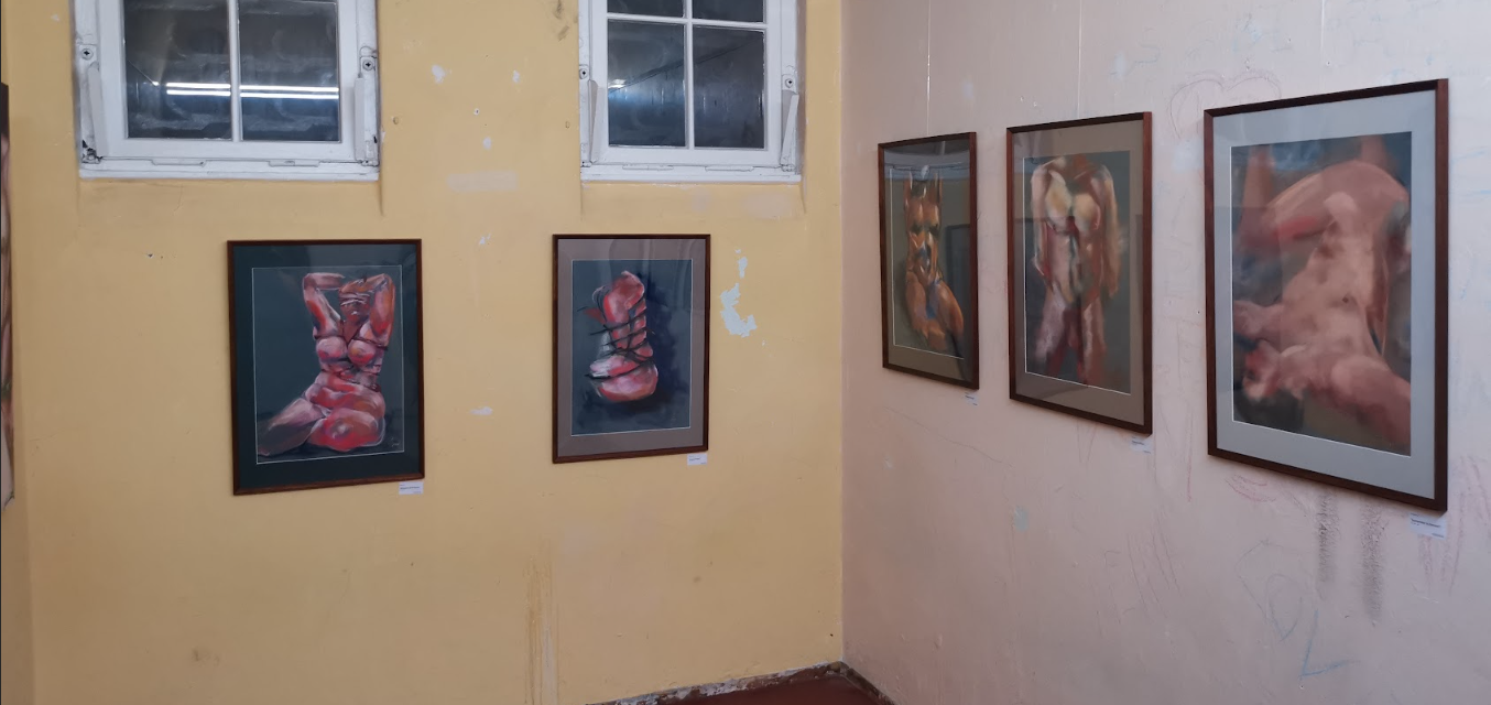 View of the submitted works by Bogdan Jensen at the Pride Art Exhibition, from life models, made in soft pastel and framed in wooden frames. 