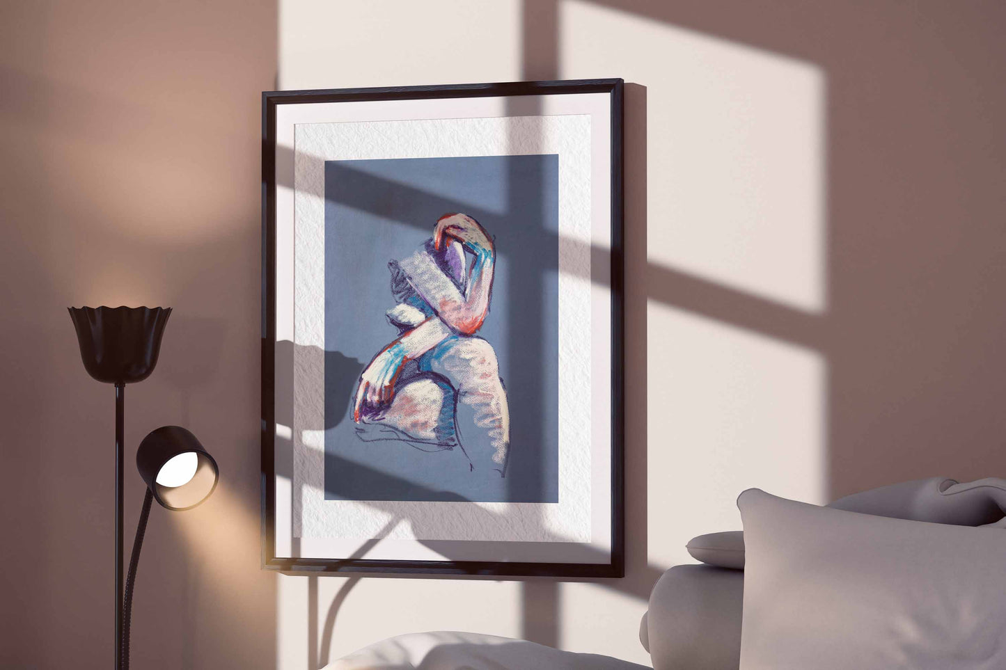 A Gentle Touch fine art print by Bogdan Jensen displayed in a framed bedroom mockup with soft window shadows and a seated pastel figure study