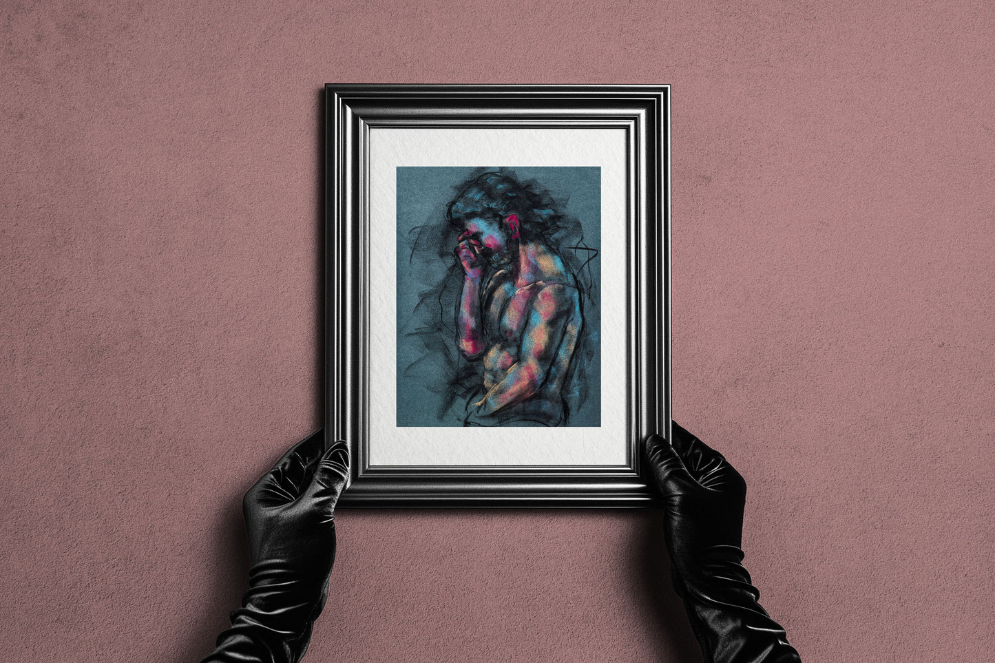 Framed A Quiet Ache fine art print by Bogdan Jensen held by hands, showing the reflective figure drawing in a dark frame