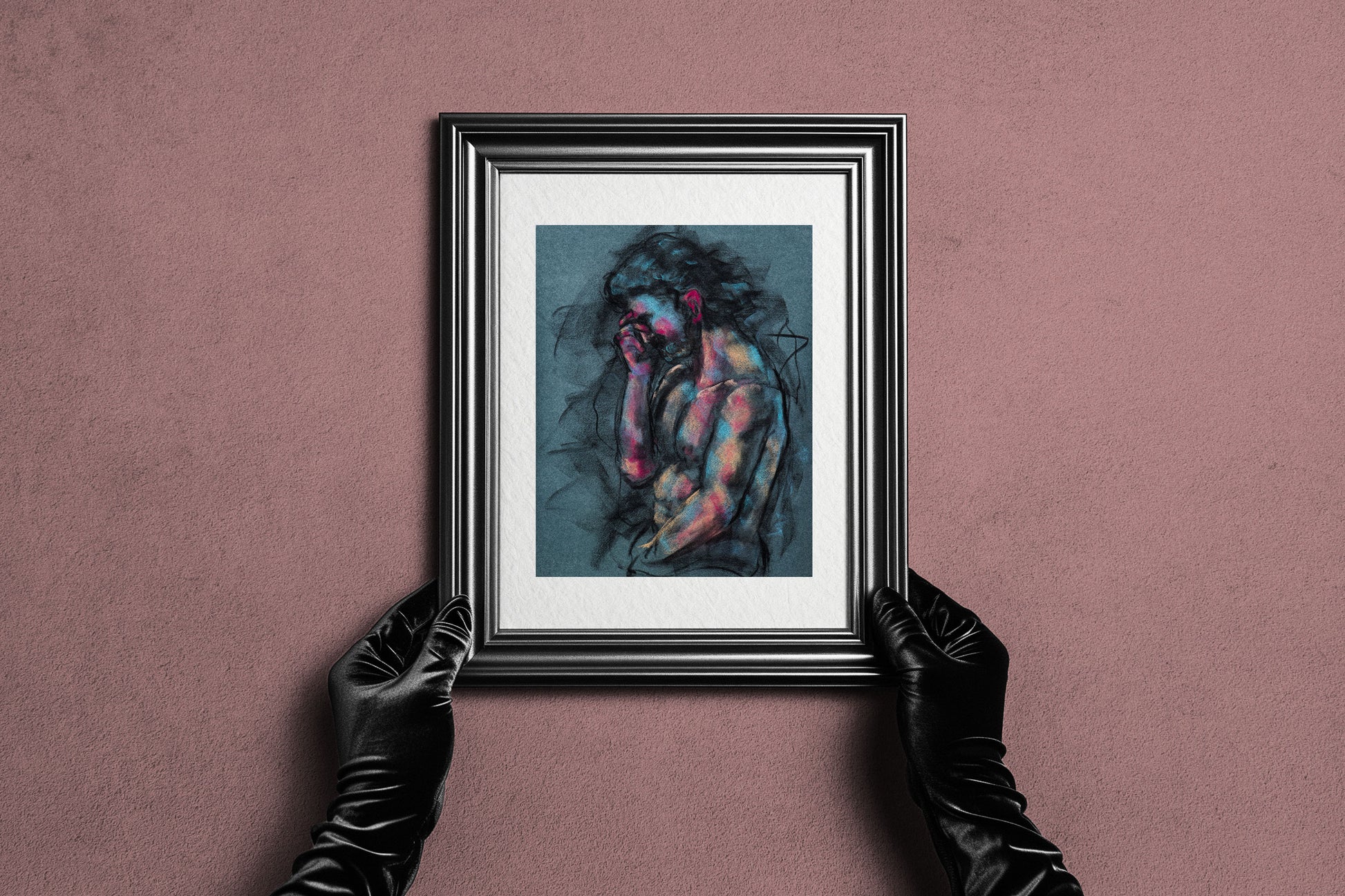 Framed A Quiet Ache fine art print by Bogdan Jensen held by hands, showing the reflective figure drawing in a dark frame