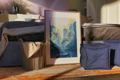 Blue Passage fine art print by Bogdan Jensen displayed on a bedroom floor, showing the blue-toned painting in a relaxed interior setting