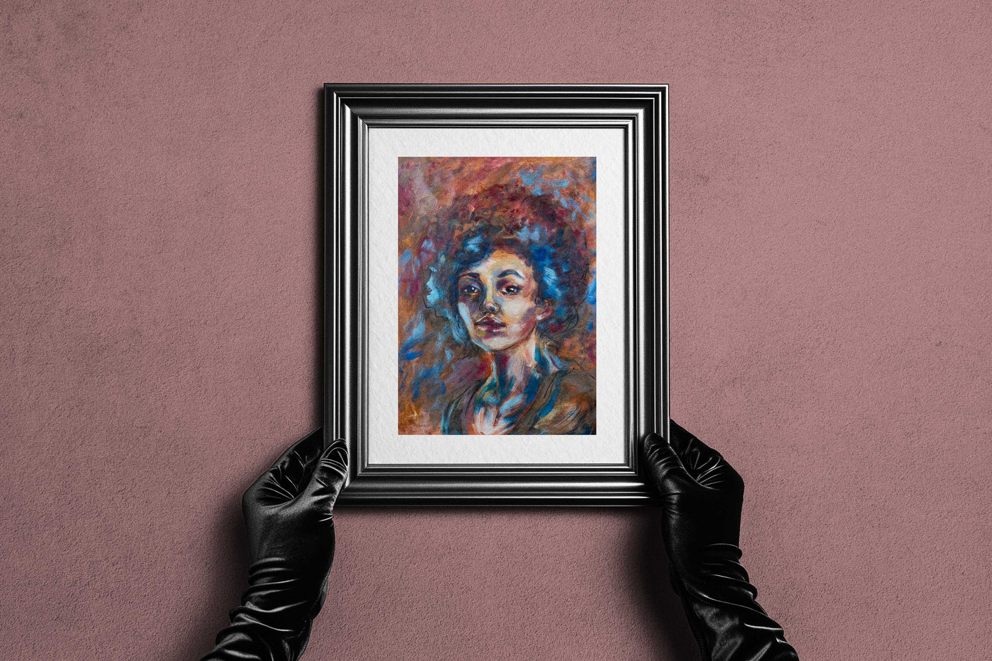 Framed Blue Tempest fine art print by Bogdan Jensen held by hands, showing the colourful soft pastel portrait in a dark frame