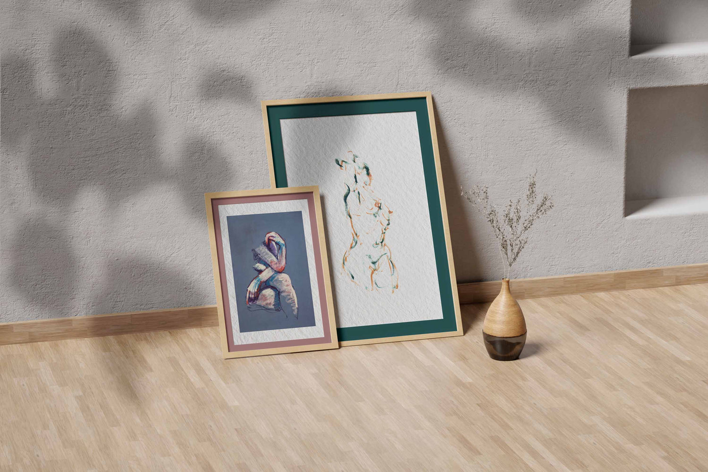 Dancing into Form fine art print by Bogdan Jensen shown leaning in a floor frame, with the loose figure drawing beside a smaller framed artwork