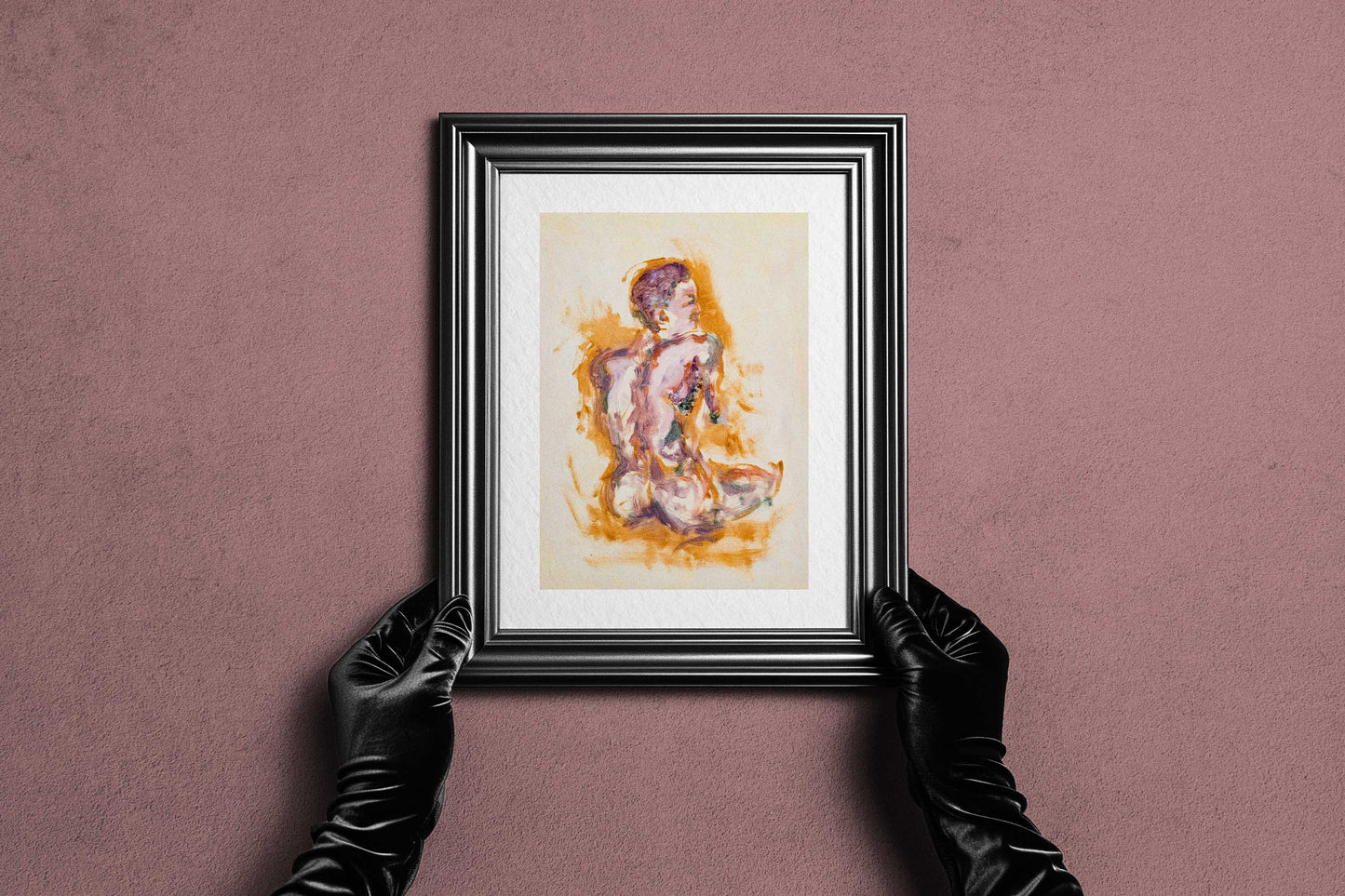 Framed Felt through Gold fine art print by Bogdan Jensen held by hands, showing the seated figure painting in a dark frame