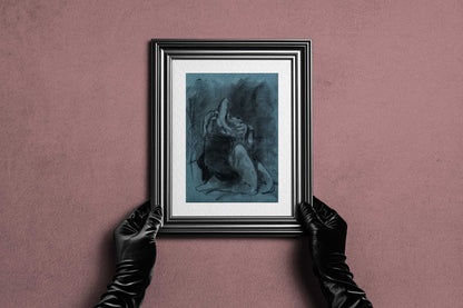 Framed Returned from Shadow fine art print by Bogdan Jensen held by hands, showing the blue-toned charcoal figure drawing in a dark frame