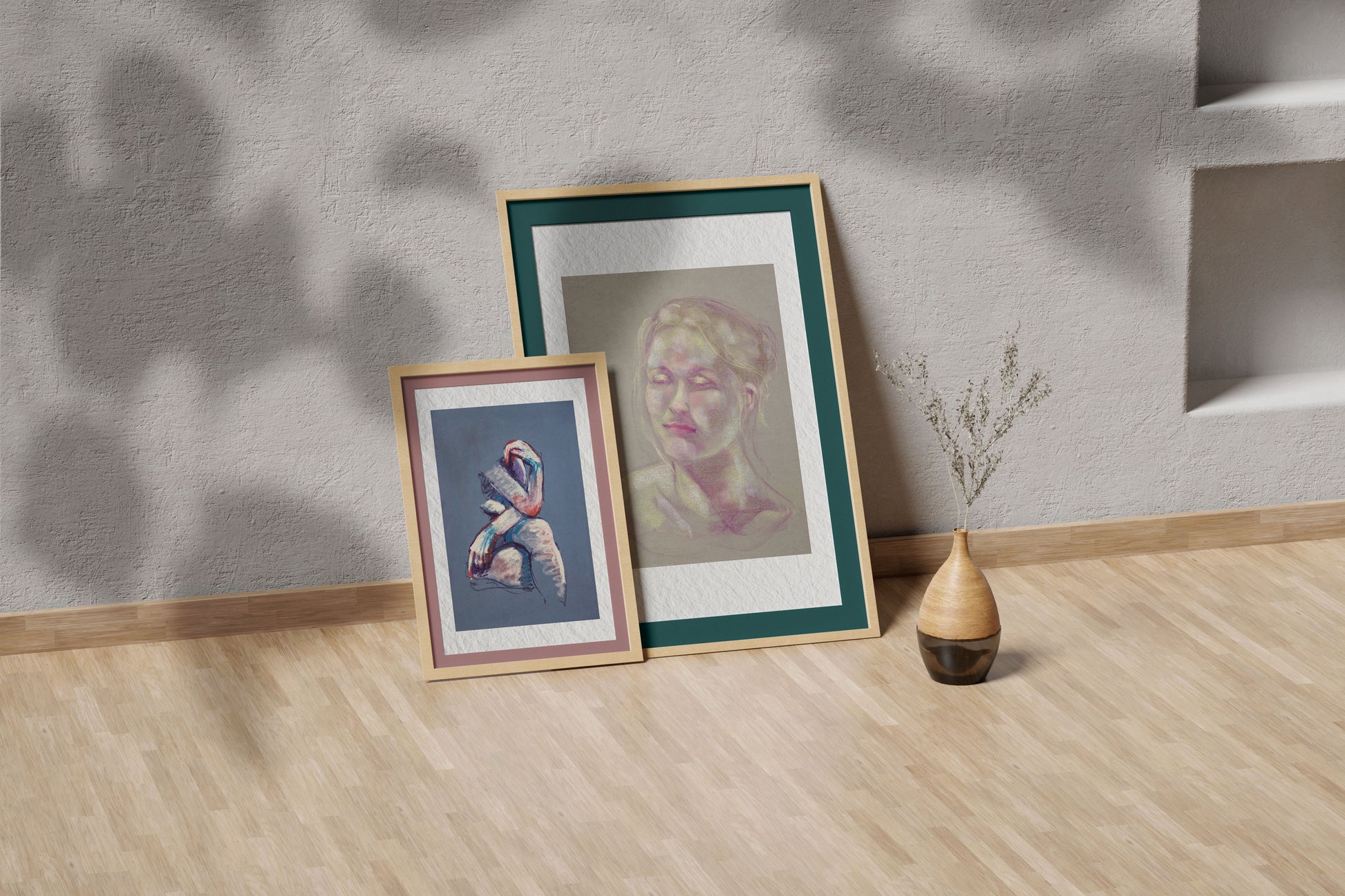 Soft Glow fine art print by Bogdan Jensen shown leaning in a floor frame, with the soft pastel portrait beside a smaller framed artwork