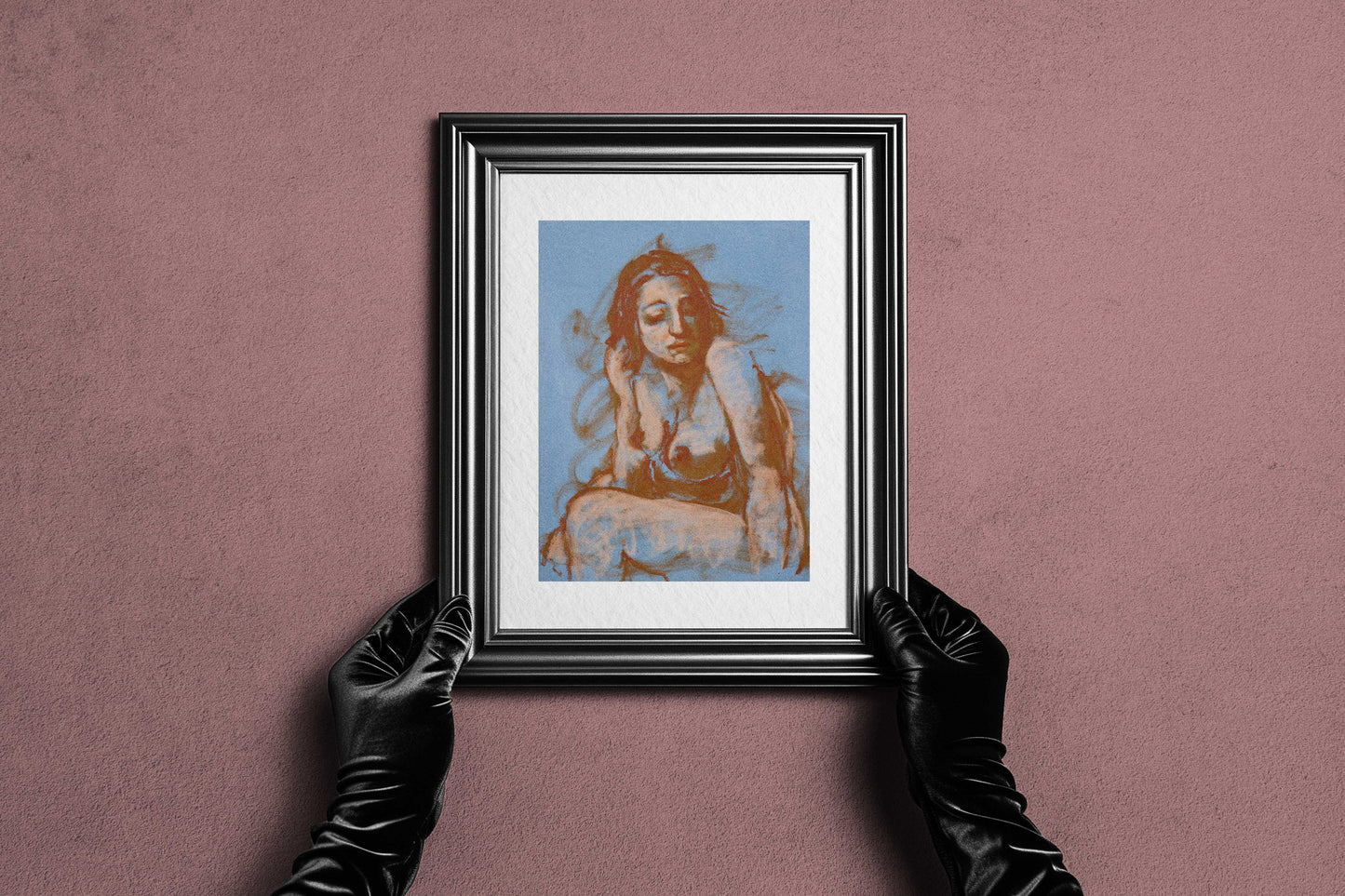 Small framed Soft Whisper fine art print by Bogdan Jensen, held against a pink textured wall in an elegant black frame.