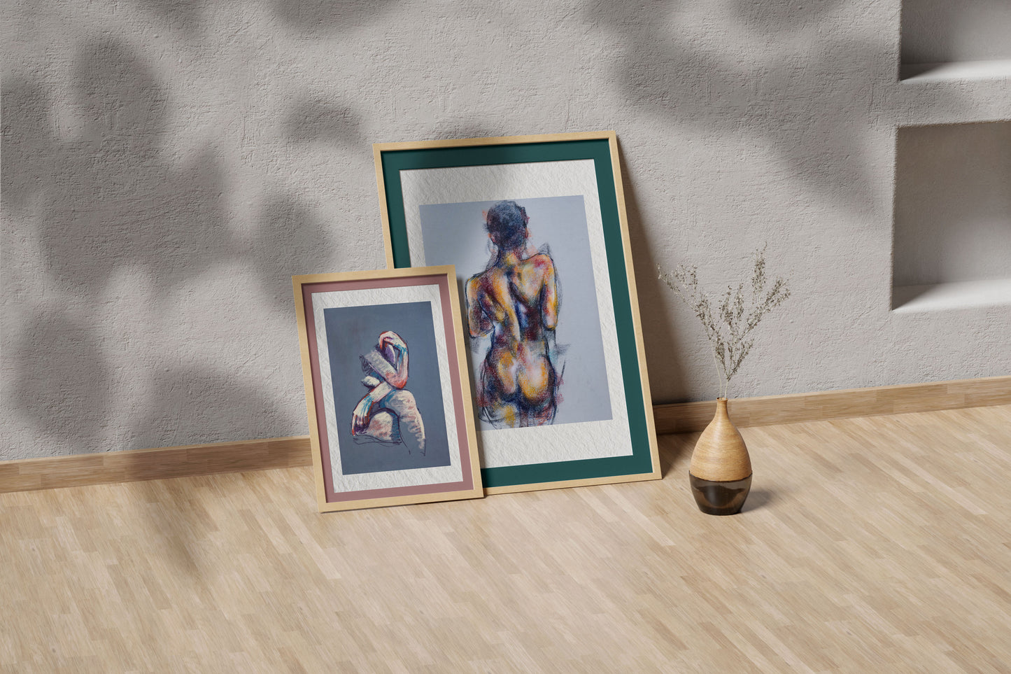 Where the Dance Lives fine art print by Bogdan Jensen shown leaning in a floor frame, with the pastel figure study beside a smaller framed artwork