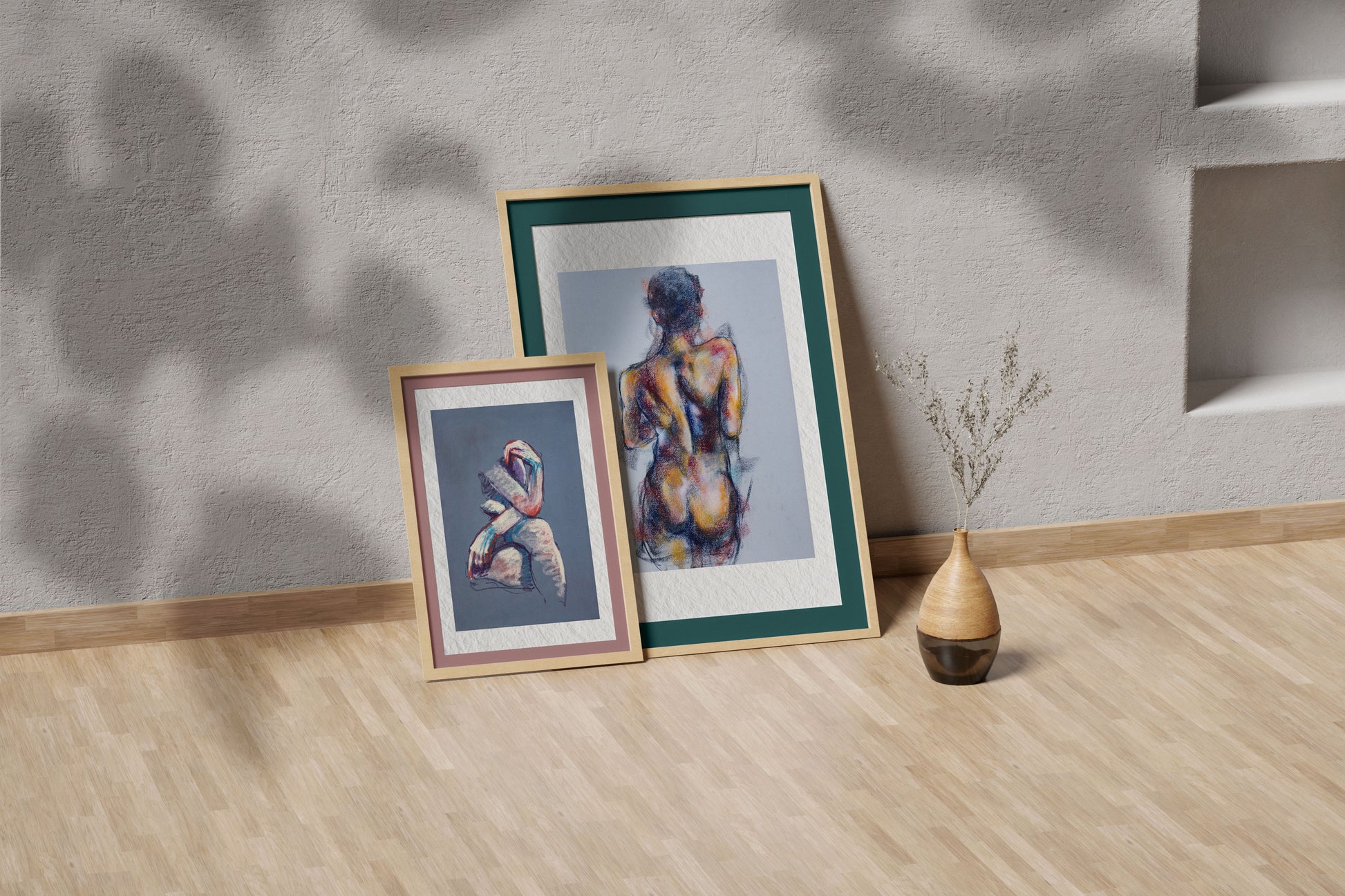 Where the Dance Lives fine art print by Bogdan Jensen shown leaning in a floor frame, with the pastel figure study beside a smaller framed artwork